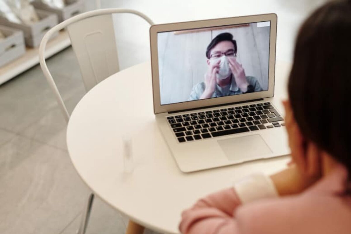 Patient talking to doctor through telehealth